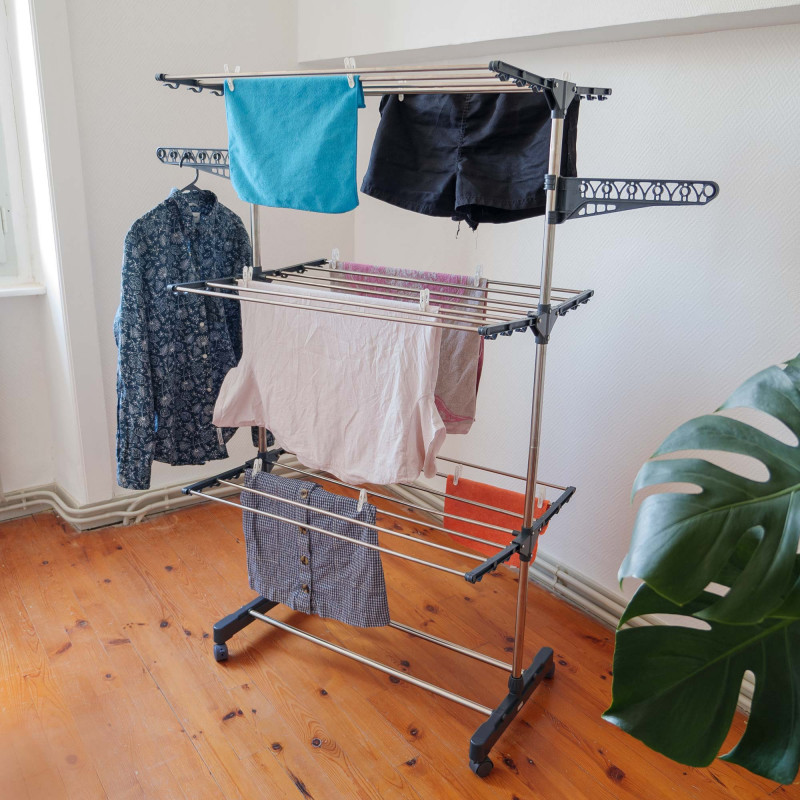 Etendoir pliable sur roulettes - 3 niveaux - Séchoir à linge acier - H145 cm - 10 cintres - 20 pinces à linges - 2 porte-cintres